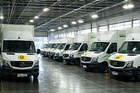 Multiple fleet vehicles being washed