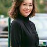 Repeat customer Minji Yu next to car